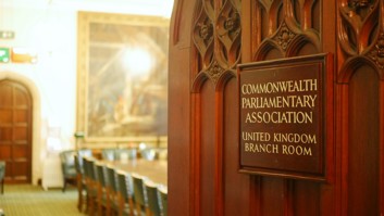 Open door leading to a meeting room. Sign on the open door reads 'Commonwealth Parliamentary Association United Kingdom Branch Room'